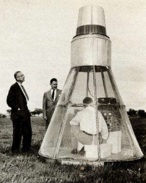 Arthur A. Collins (Left), President, And Dr. Harold V. Gaskill, Vp, Planning, Examine Full-Scale Antenna Test Mockup.